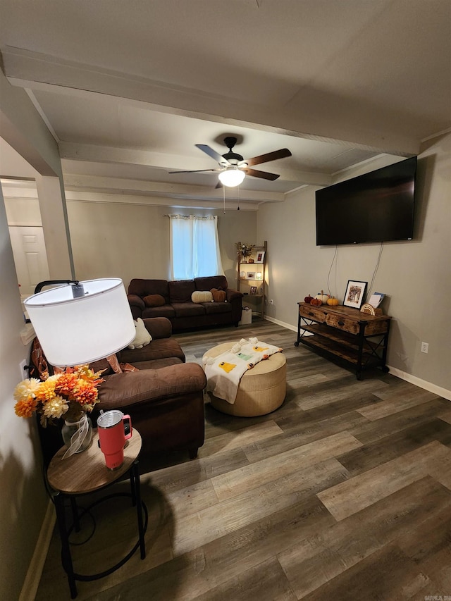 living room featuring wood-type flooring, beam ceiling, and ceiling fan