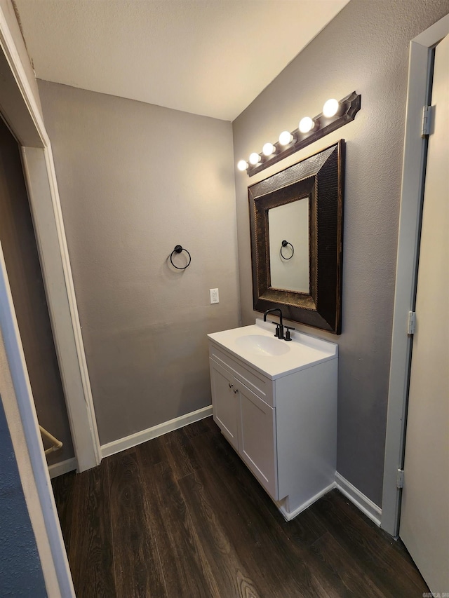 bathroom with wood-type flooring and vanity