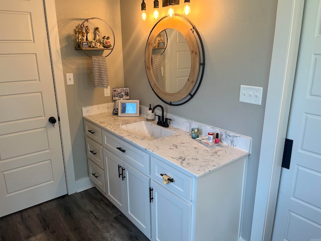 bathroom featuring vanity and hardwood / wood-style floors