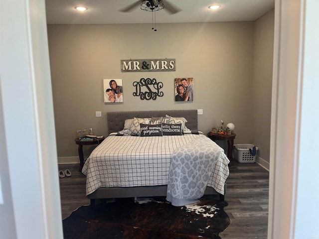 bedroom with hardwood / wood-style flooring and ceiling fan