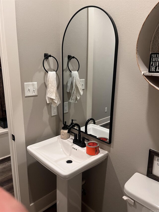 444 W Pleasant Springs Rd, Quitman, AR 72131 - half bathroom with toilet and a sink