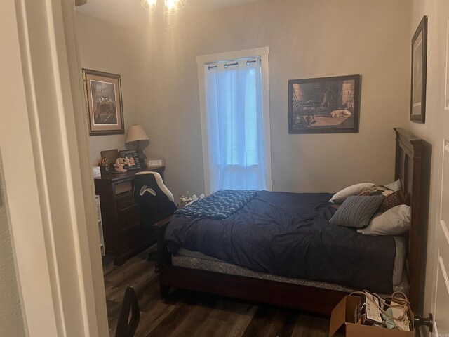 444 W Pleasant Springs Rd, Quitman, AR 72131 - bedroom featuring dark wood-type flooring