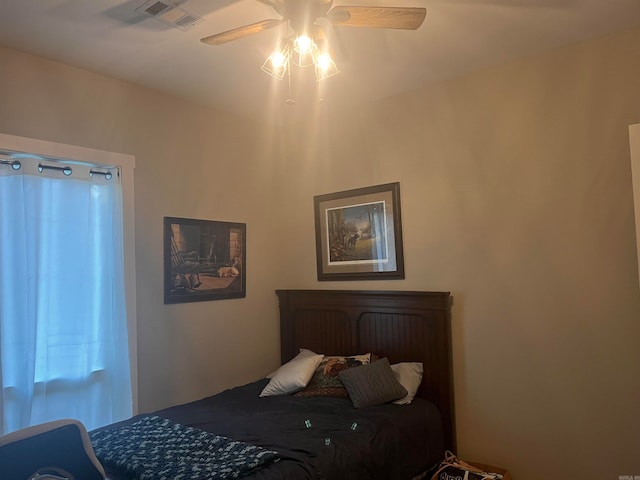 bedroom featuring ceiling fan