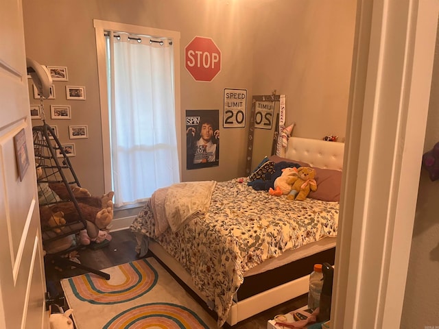 bedroom featuring hardwood / wood-style floors