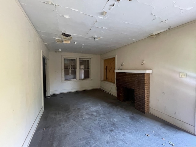 unfurnished living room featuring a fireplace