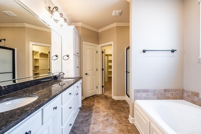 bathroom featuring crown molding, shower with separate bathtub, and vanity