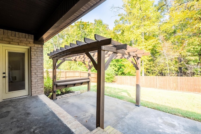 view of patio featuring a pergola