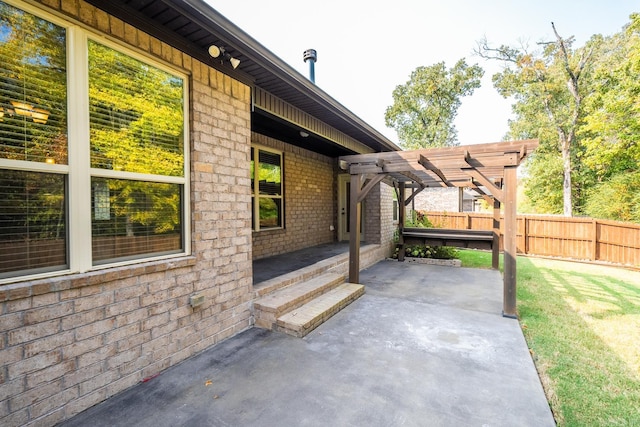 view of patio featuring a pergola