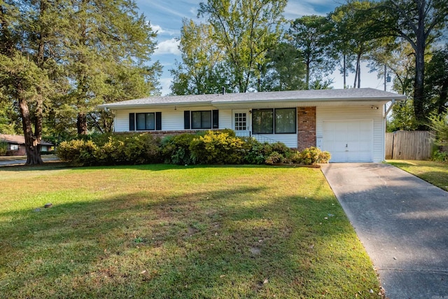 single story home featuring a front yard and a garage