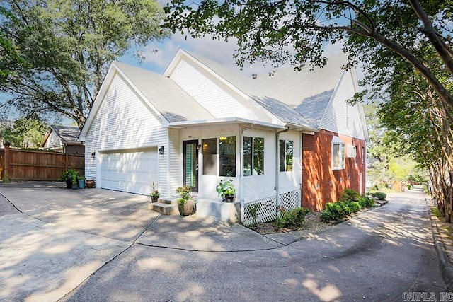 view of front of home with a garage