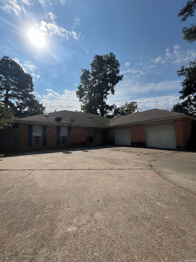 single story home with a garage