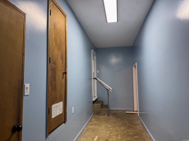 corridor with concrete floors