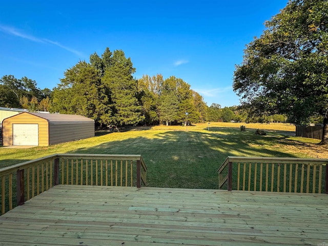 deck with an outdoor structure, a garage, and a lawn