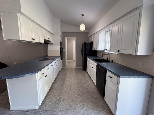 kitchen featuring white cabinets, lofted ceiling, sink, decorative light fixtures, and black appliances