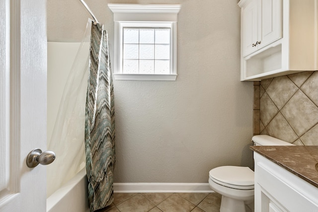 full bathroom featuring vanity, tasteful backsplash, shower / bathtub combination with curtain, tile patterned floors, and toilet