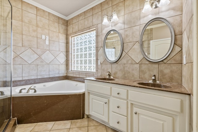 bathroom featuring vanity, tiled bath, and tile walls