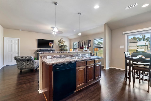 kitchen with dishwasher, plenty of natural light, dark wood-type flooring, and a kitchen island with sink