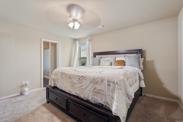 bedroom with light carpet and ceiling fan