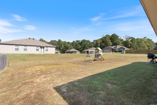 view of yard with a playground