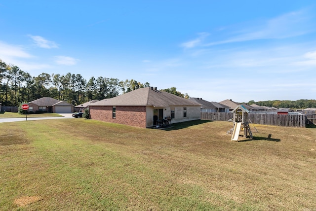 view of yard featuring a garage