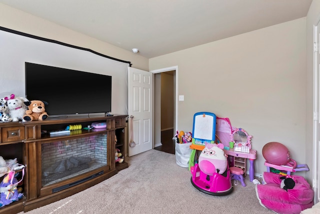 game room featuring light colored carpet