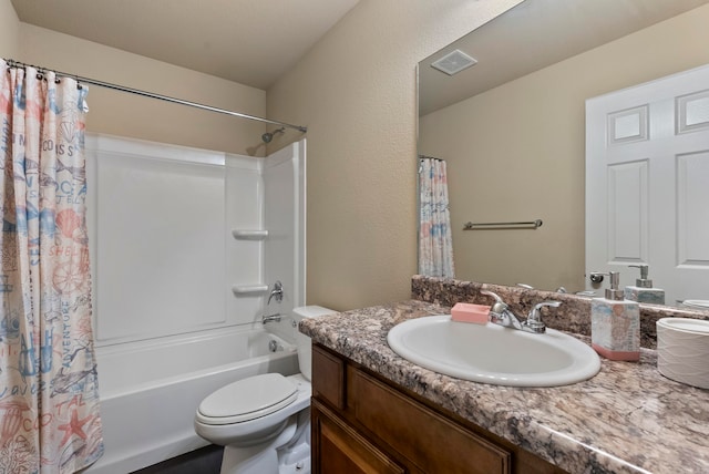 full bathroom with shower / bathtub combination with curtain, vanity, and toilet