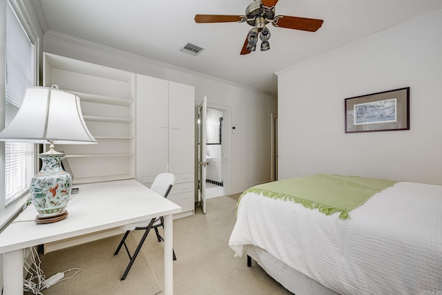 bedroom featuring ceiling fan and crown molding