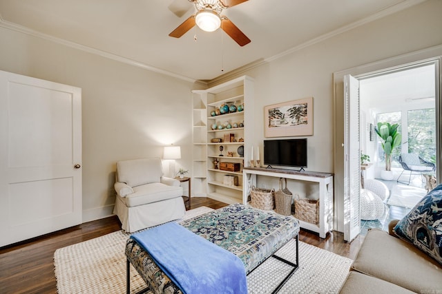 living room with ceiling fan, dark hardwood / wood-style floors, and ornamental molding