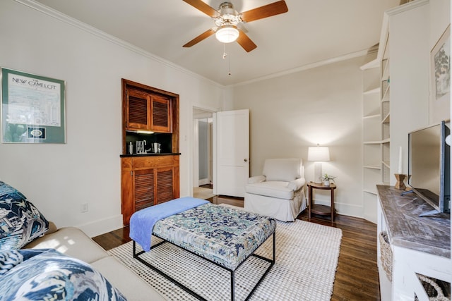 living room featuring crown molding, ceiling fan, and dark wood-type flooring