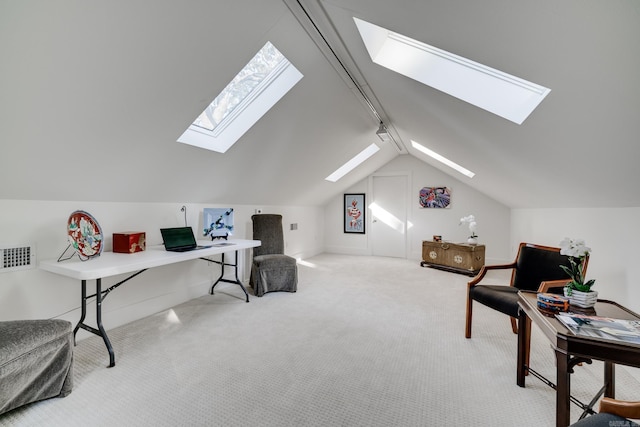 office space with lofted ceiling and carpet flooring