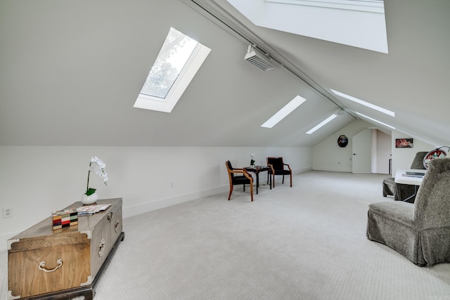 bonus room with lofted ceiling and carpet flooring