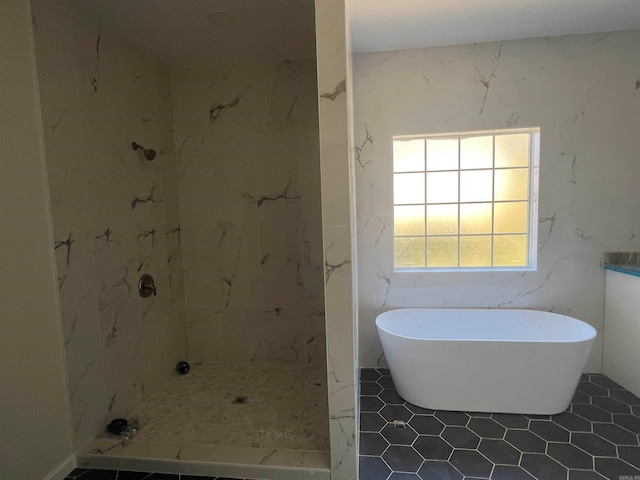 bathroom with separate shower and tub