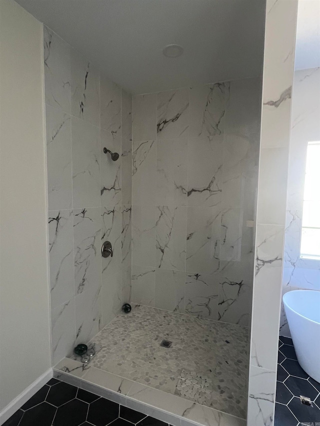 bathroom with separate shower and tub