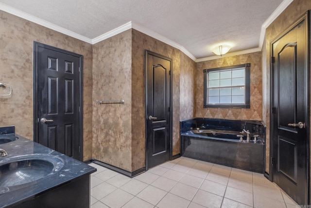 bathroom featuring ornamental molding, a textured ceiling, a washtub, and tile patterned flooring