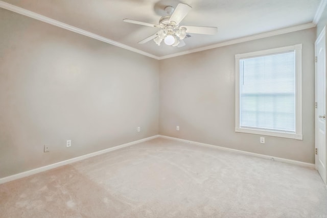 unfurnished room with light carpet, ornamental molding, and ceiling fan