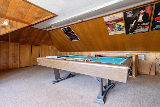 game room featuring vaulted ceiling, light colored carpet, billiards, and wood walls