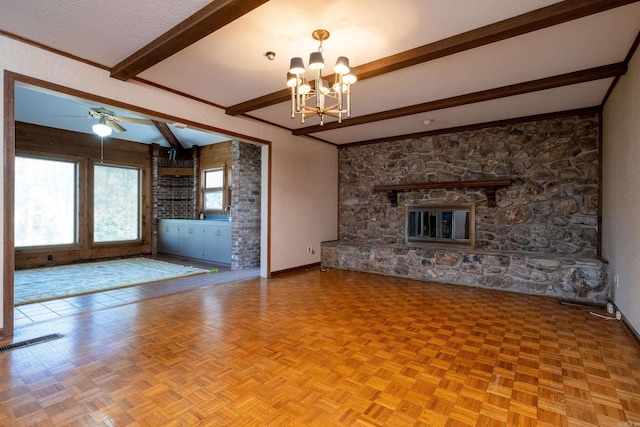 unfurnished living room featuring parquet flooring, a textured ceiling, beam ceiling, and ceiling fan with notable chandelier