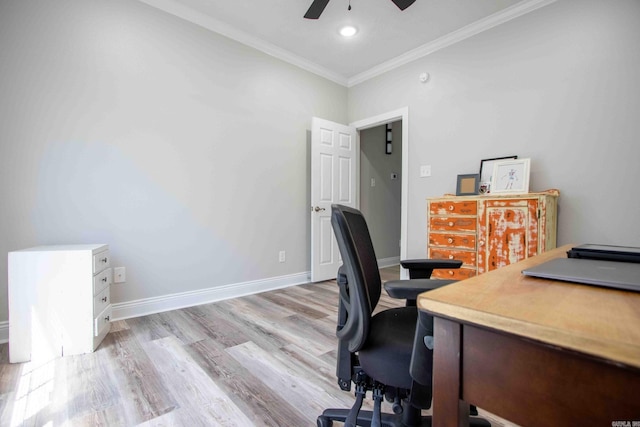 office space featuring ceiling fan, ornamental molding, and light hardwood / wood-style floors