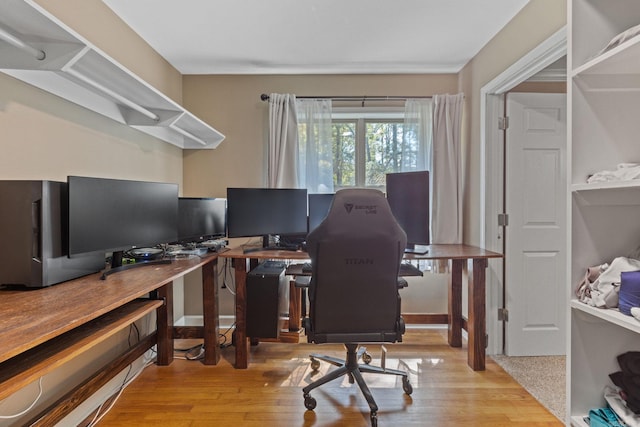 home office with wood finished floors