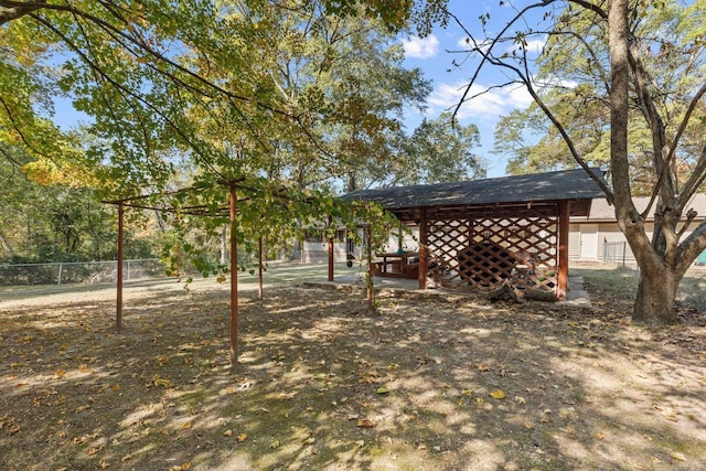 view of yard featuring fence