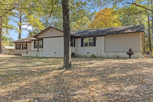 back of house with crawl space