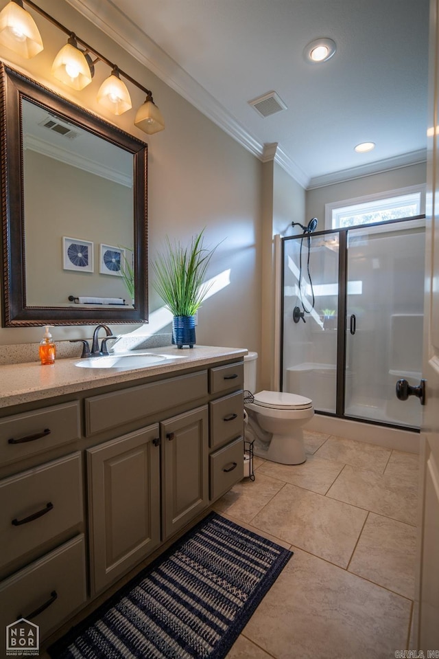 bathroom with toilet, ornamental molding, a shower with shower door, vanity, and tile patterned flooring