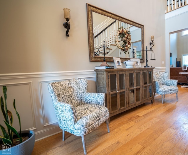 sitting room with light hardwood / wood-style floors