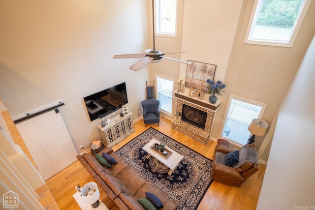 living room featuring a healthy amount of sunlight and hardwood / wood-style flooring