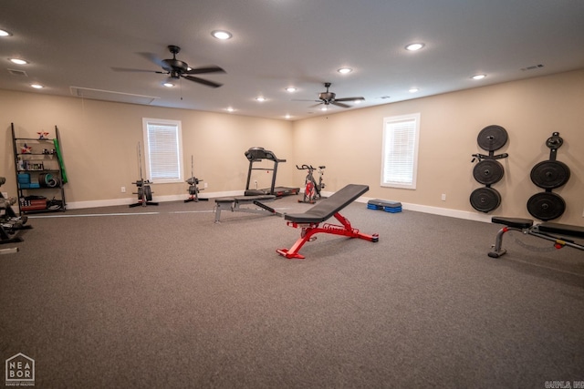 exercise area featuring carpet flooring and ceiling fan