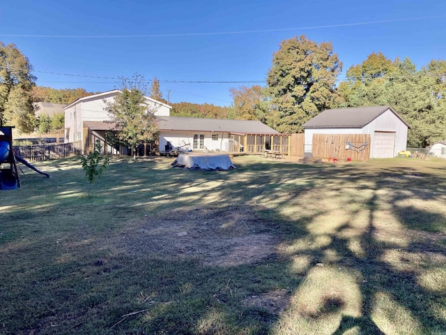 183 Sunny Gap Rd, Conway, AR 72032 - view of yard featuring a detached garage and an outdoor structure