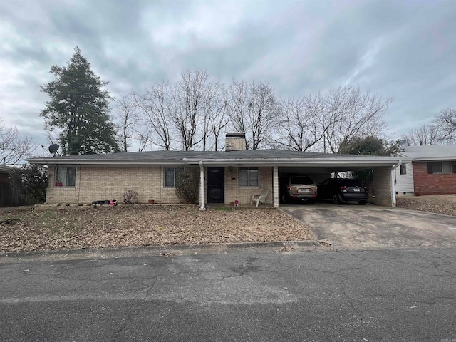 single story home with a carport