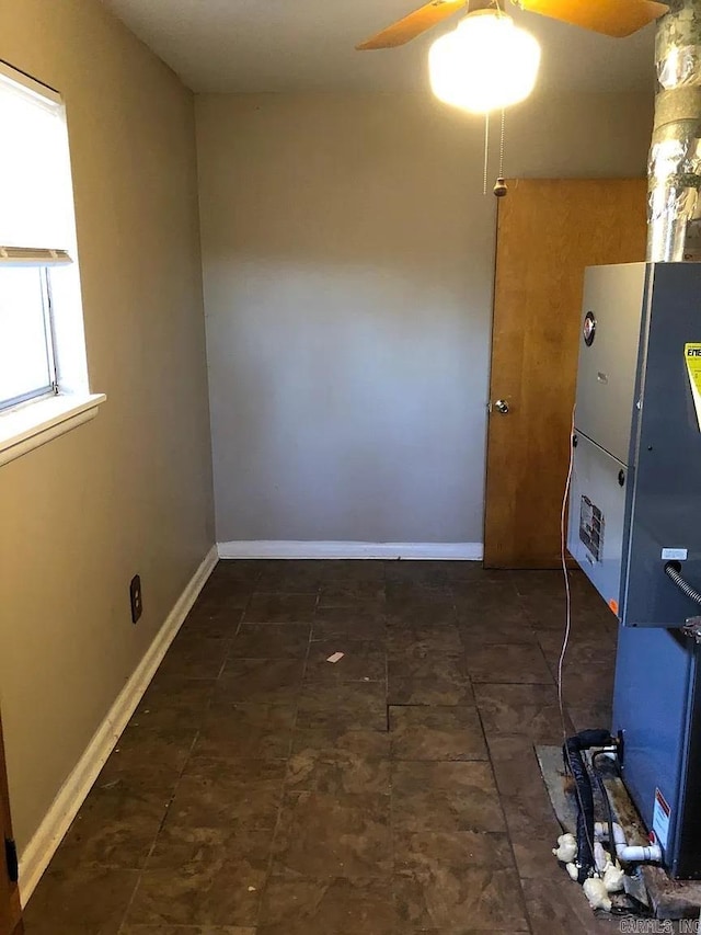 laundry room featuring ceiling fan
