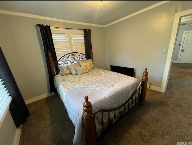 bedroom featuring dark carpet and crown molding