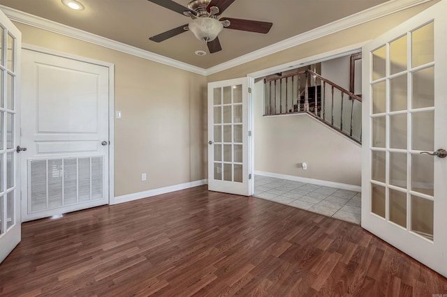 spare room with ornamental molding, french doors, hardwood / wood-style flooring, and ceiling fan